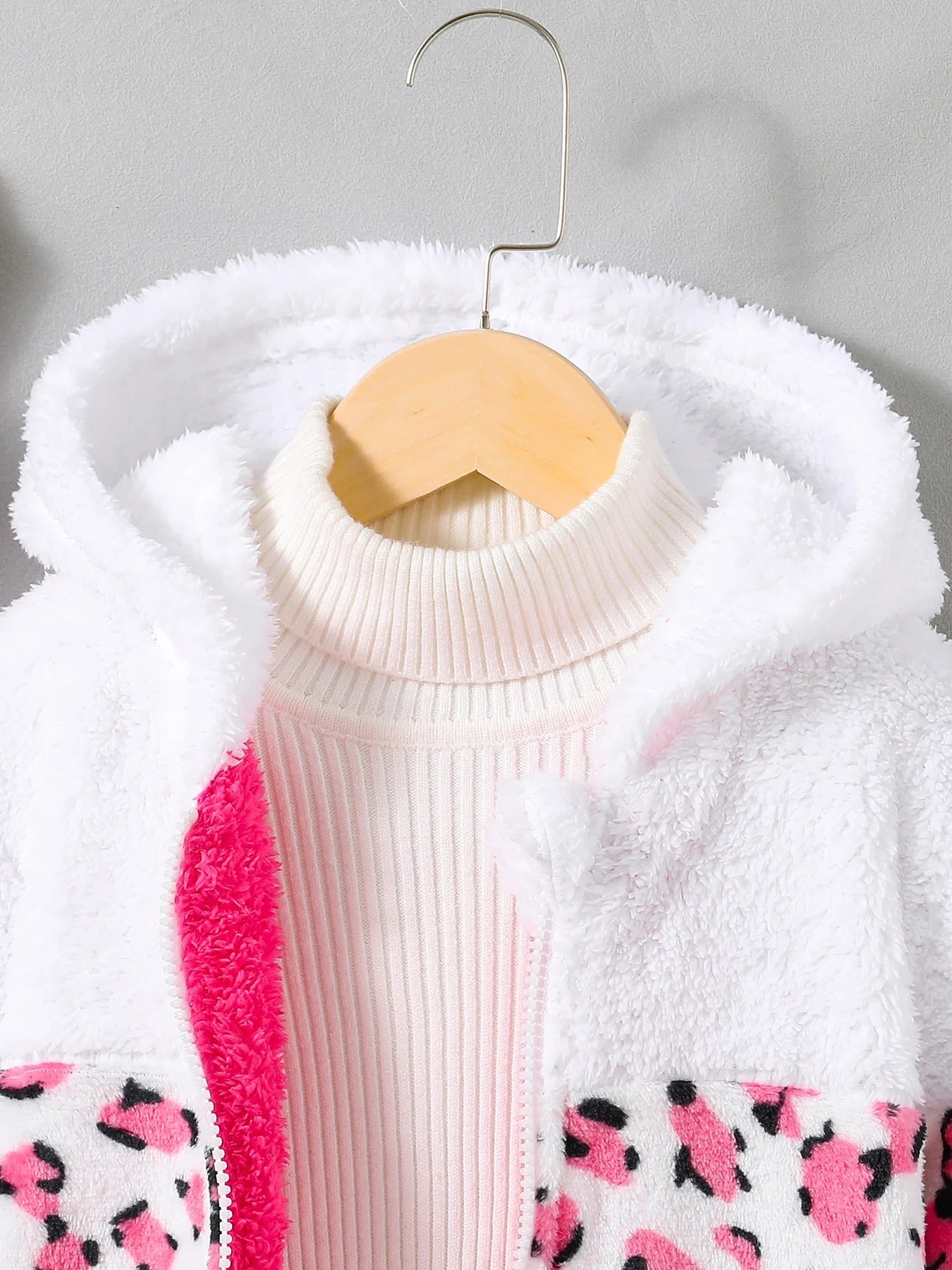 Pull peluche rose enfant